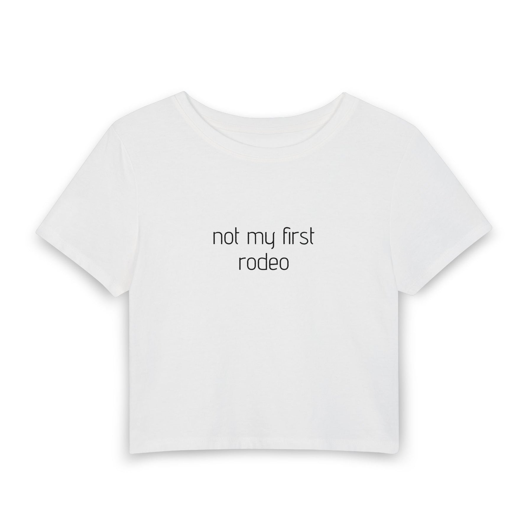 A white short-sleeve crop top t-shirt with a small gray graphic on the chest, displayed against a solid white background.